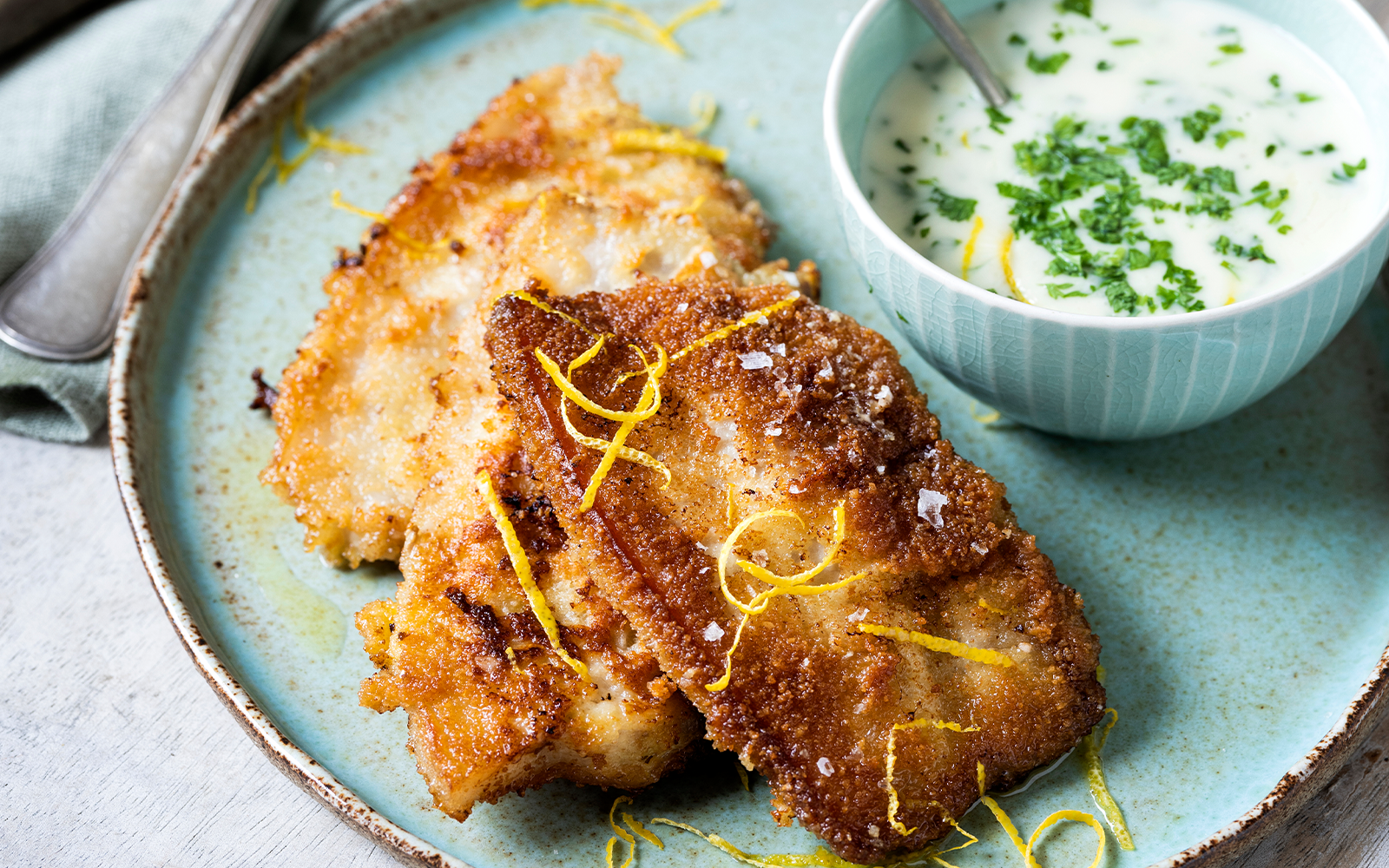 Panerat fläsk med citron- och persiljesås
