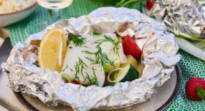Fiskpaket med squash och tomater